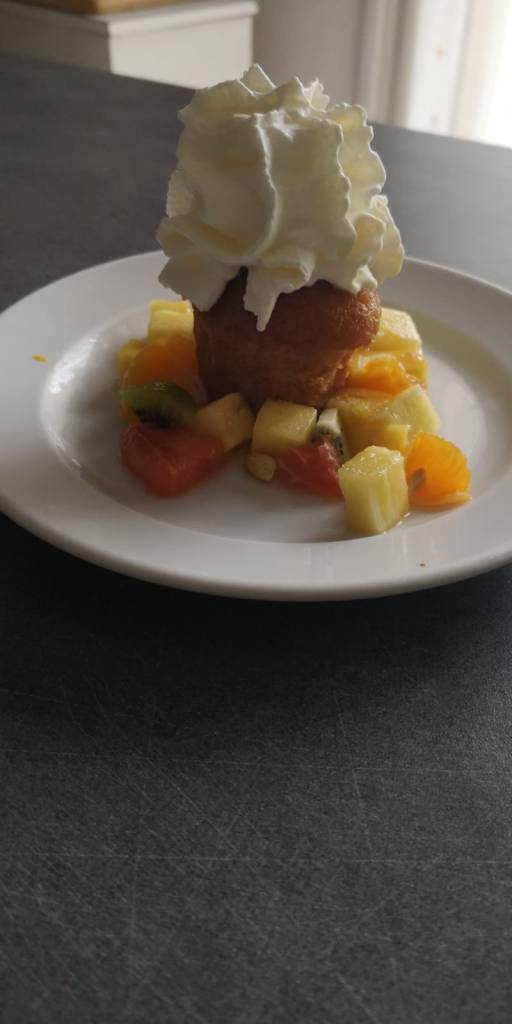 A plate of food on a table

Description automatically generated